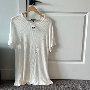 New shirt from Buckle. Never warn tags still connected.